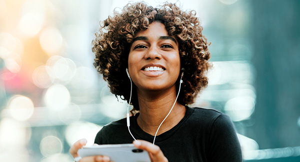 woman listening to podcast